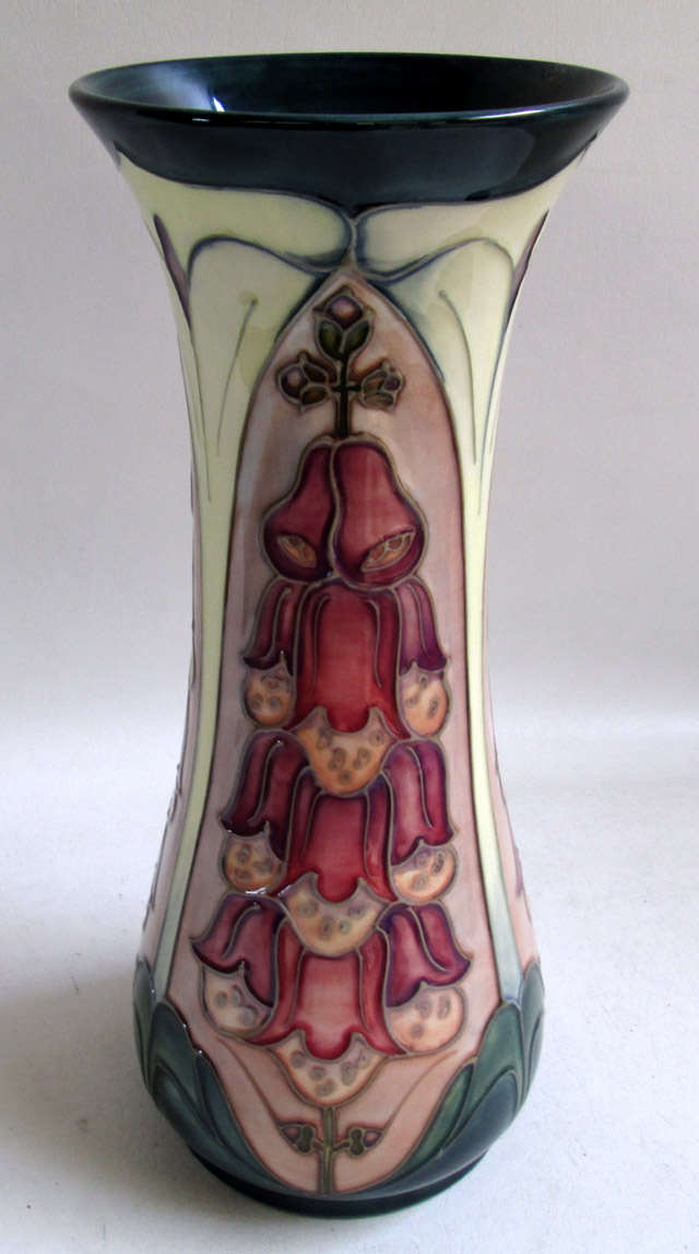 Appraisal: MOORCROFT POTTERY VASE hand painted under glaze in a fuchsia