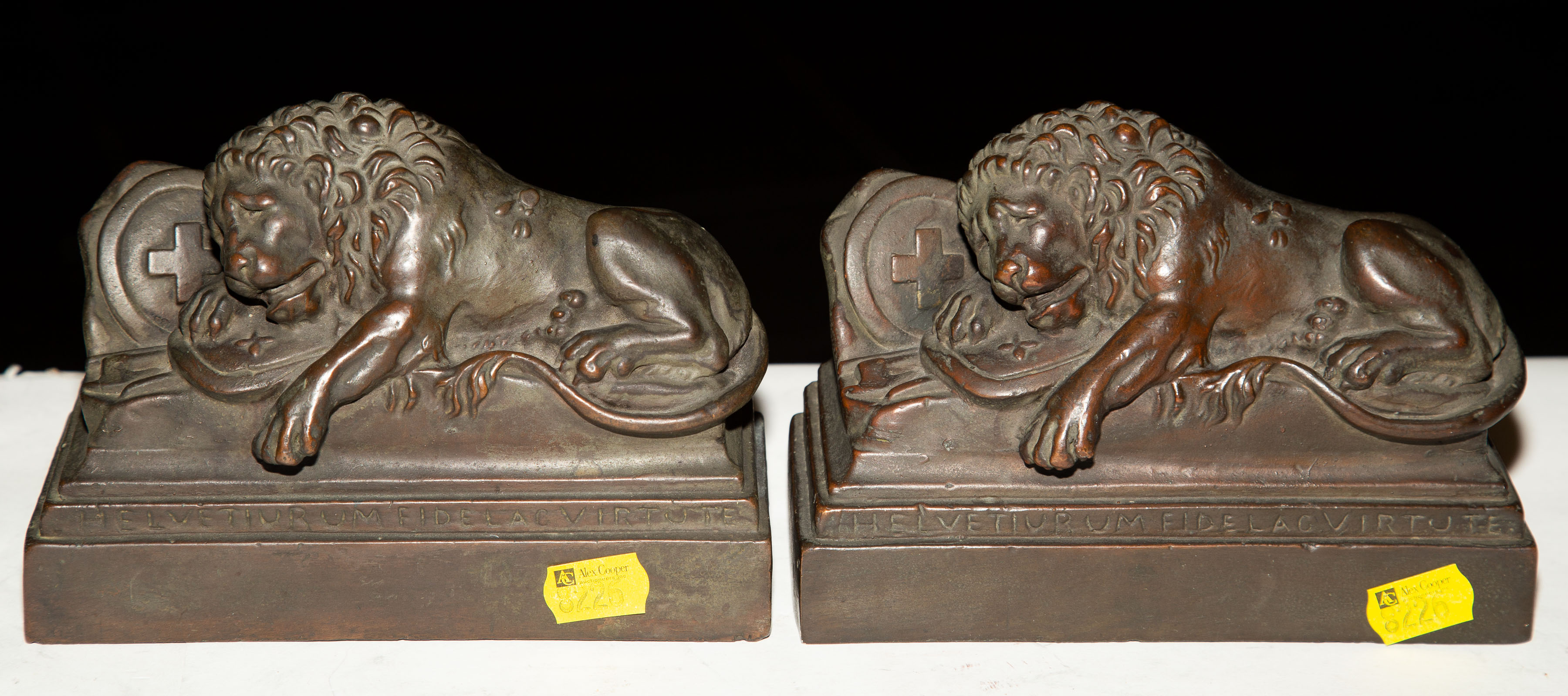 Appraisal: A PAIR OF BRONZED PLASTER LION OF LUCERNE BOOKENDS st