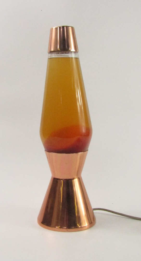 Appraisal: A copper and glass lava lamp cm high