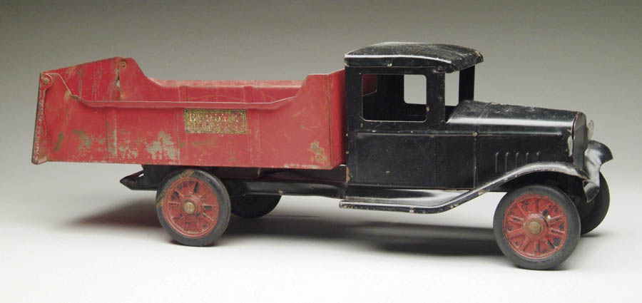 Appraisal: BUDDY L DUMP TRUCK Truck has red dump black cab