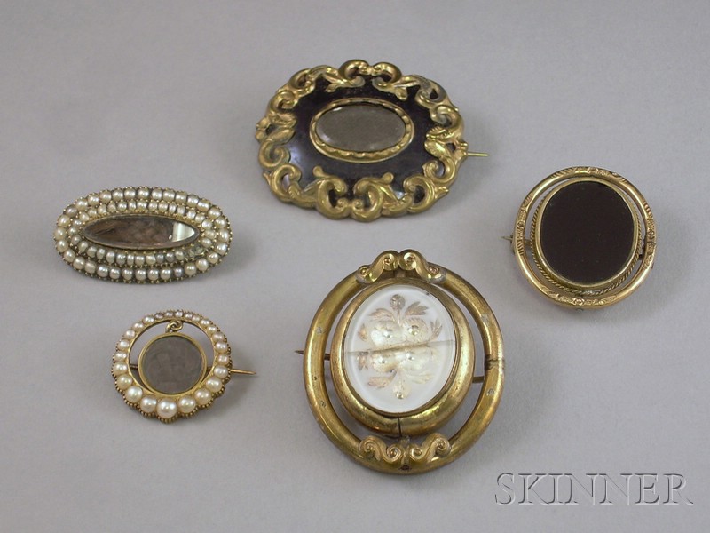 Appraisal: Five Victorian Mourning Brooches two with seed pearls one missing