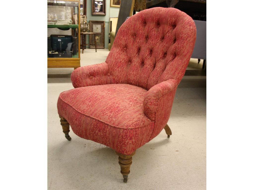 Appraisal: Victorian button back nursing chair with fancy pink upholstery upon