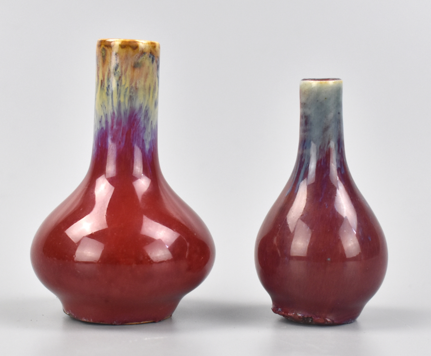 Appraisal: Two Chinese diminutive flambe glazed vases with purple at top