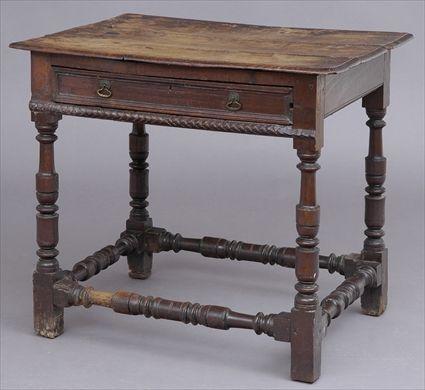 Appraisal: FLEMISH BAROQUE OAK SIDE TABLE The -plank top above a