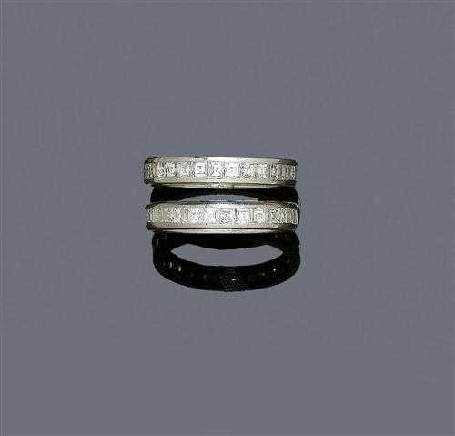 Appraisal: A PAIR OF DIAMOND RINGS ca White gold Two classic