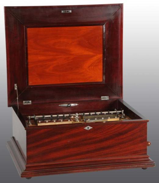 Appraisal: Sublime Harmonie Table Top New Century Changer Description Mahogany Four