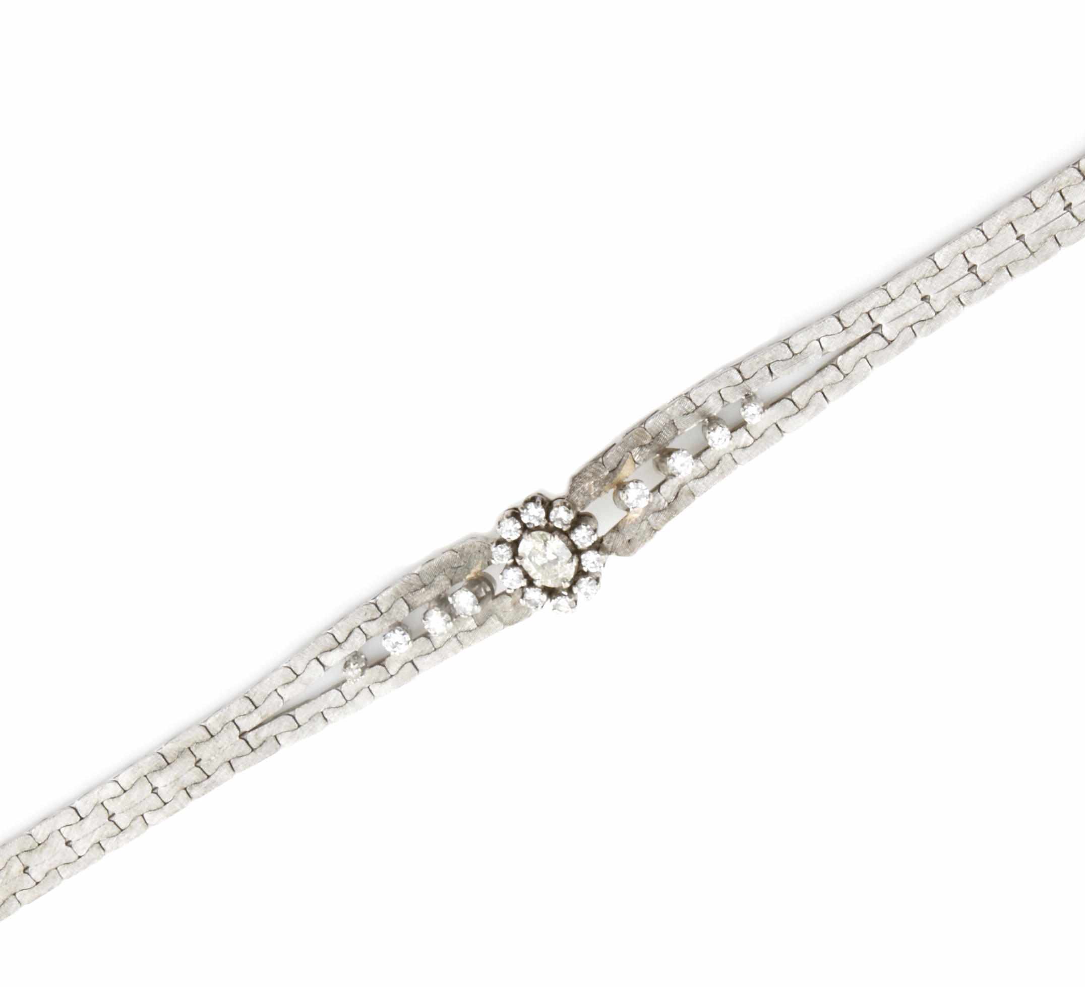 Appraisal: An oval diamond and k white gold bracelet estimated total