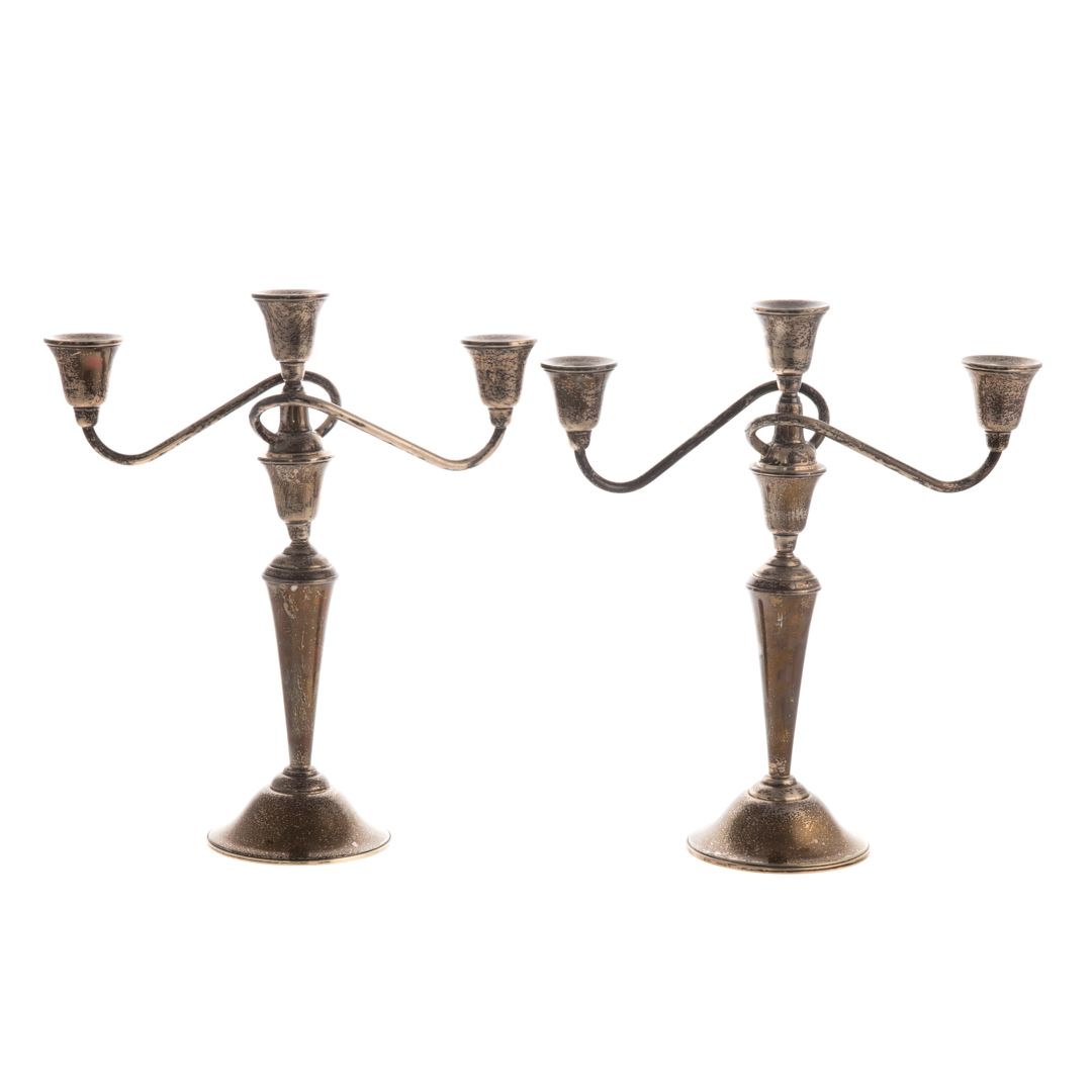 Appraisal: Pair of weighted sterling -light candelabra model by International in