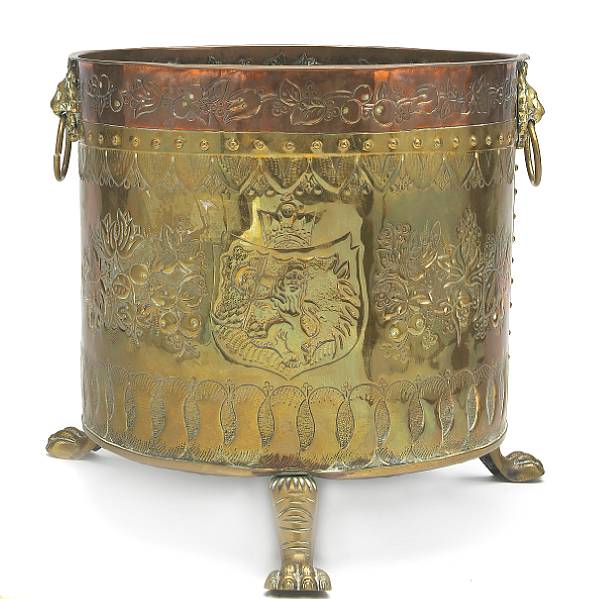 Appraisal: An Asian repousse brass and copper jardiniere height in