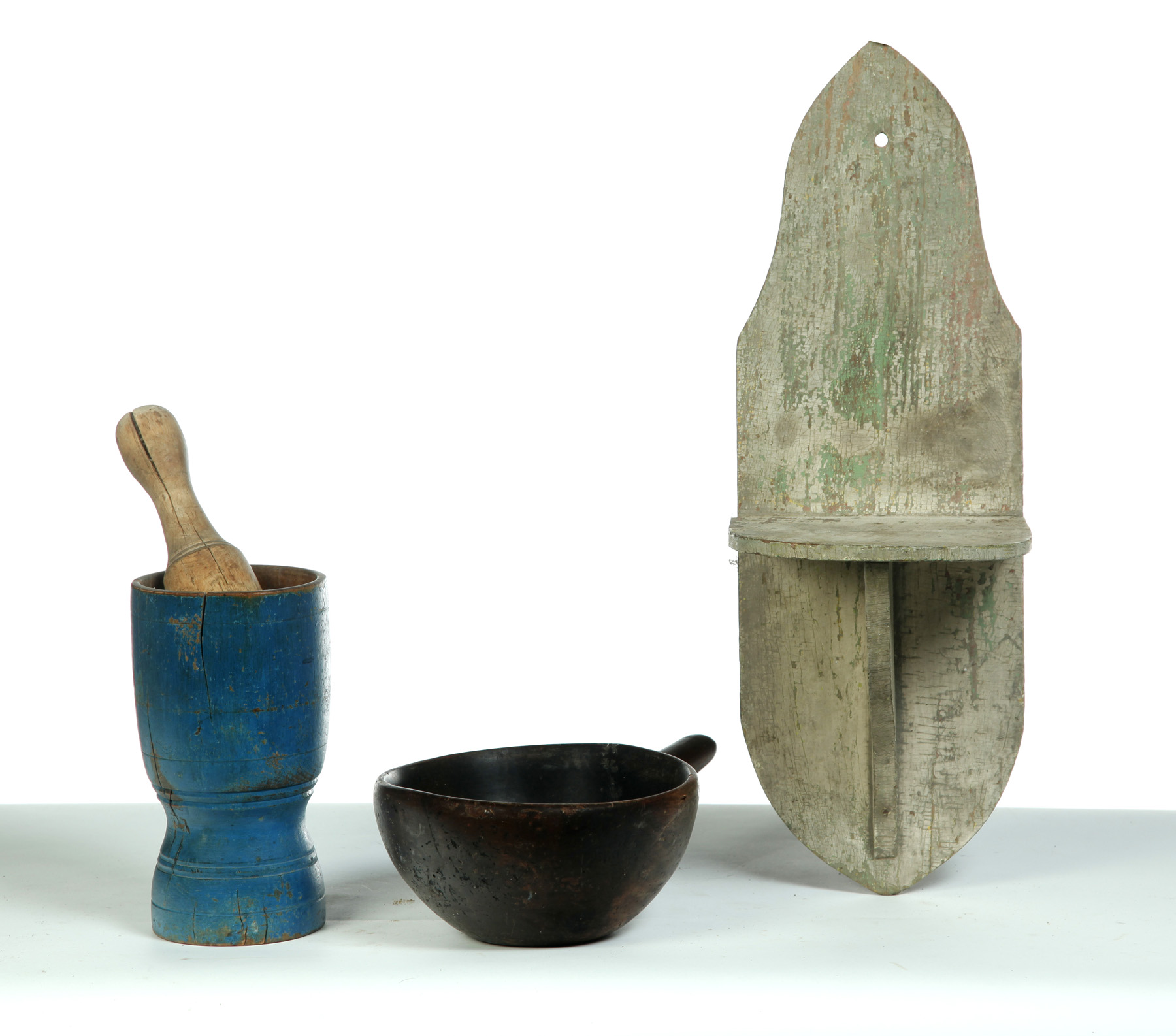 Appraisal: THREE WOODEN PIECES American nd half- th century Pestle and