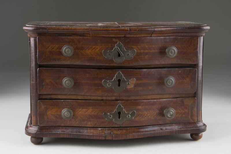 Appraisal: Continental Miniature Chest of Drawers th c swell front form