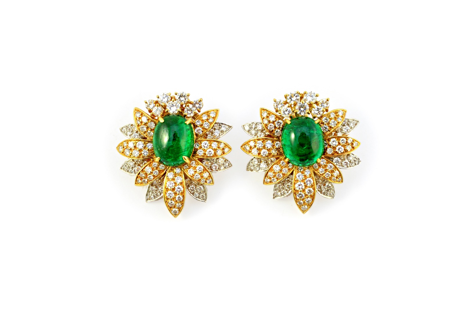 Appraisal: A pair of two colour gold cabochon emerald and diamond