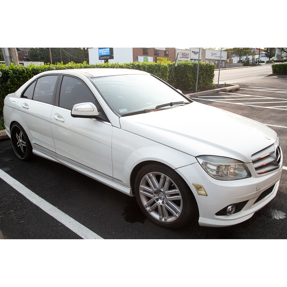 Appraisal: A Mercedes Benz C Model C white exterior -door with