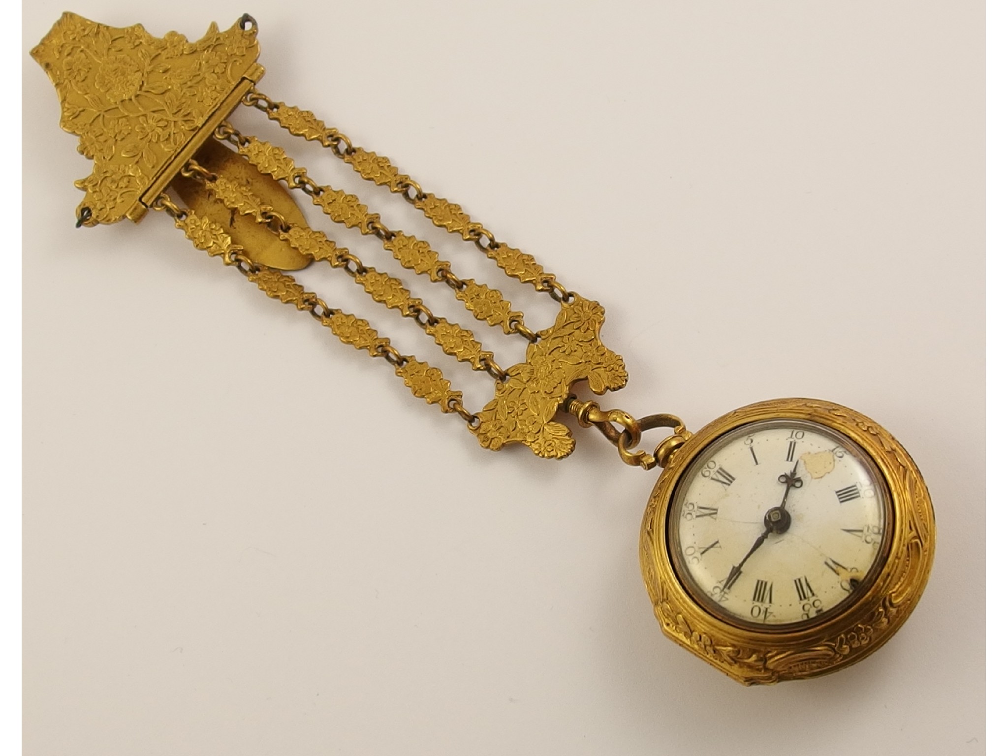 Appraisal: A Georgian ladies pair cased fob watch with attached chatelainefusee