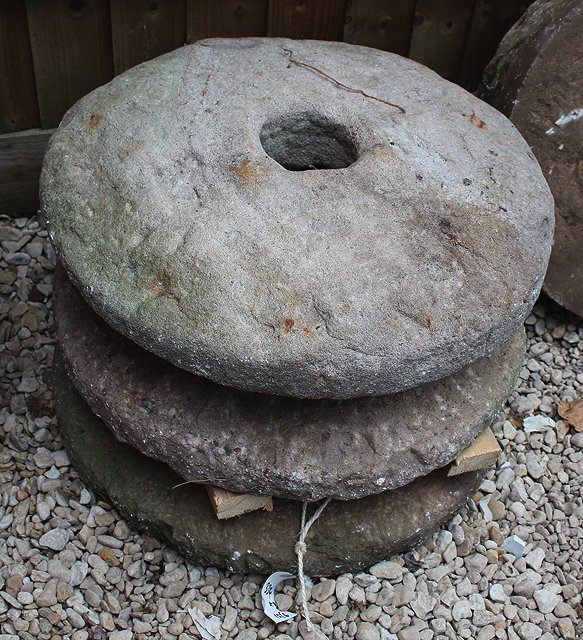 Appraisal: A GROUP OF THREE VARIOUS MILL WHEELS each approximately cm