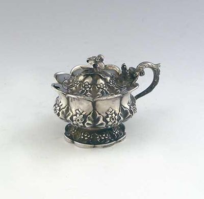 Appraisal: A William IV embossed mustard pot of polyfoil outline on