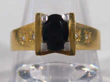 Appraisal: An carat gold sapphire solitaire ring with diamond set shoulders