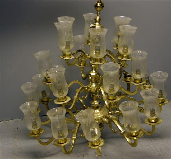 Appraisal: Dutch style three-tier twenty-four branch brass chandelier with 'S' scroll