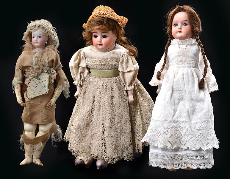 Appraisal: A GROUP OF THREE GERMAN BISQUE HEAD KID BODY DOLLS