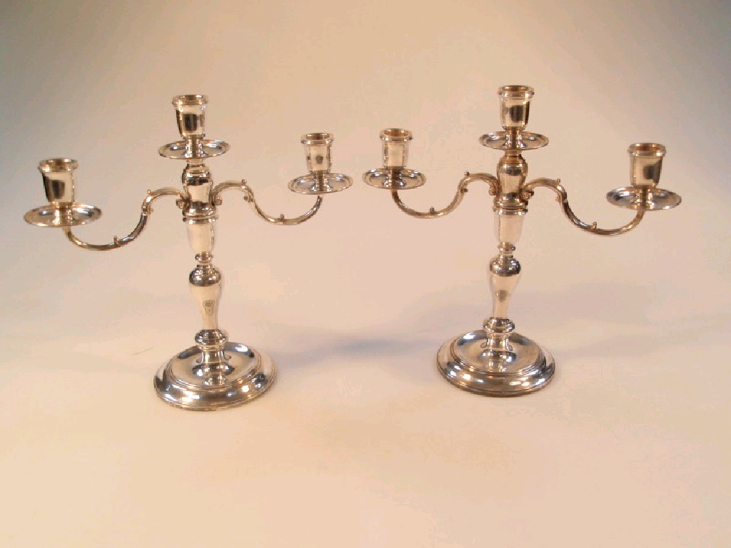 Appraisal: A pair of modern silver table candelabra by C J