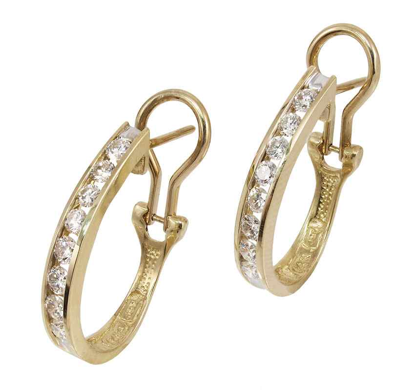 Appraisal: K DIAMOND HOOP EARRINGS K yellow gold earrings in the