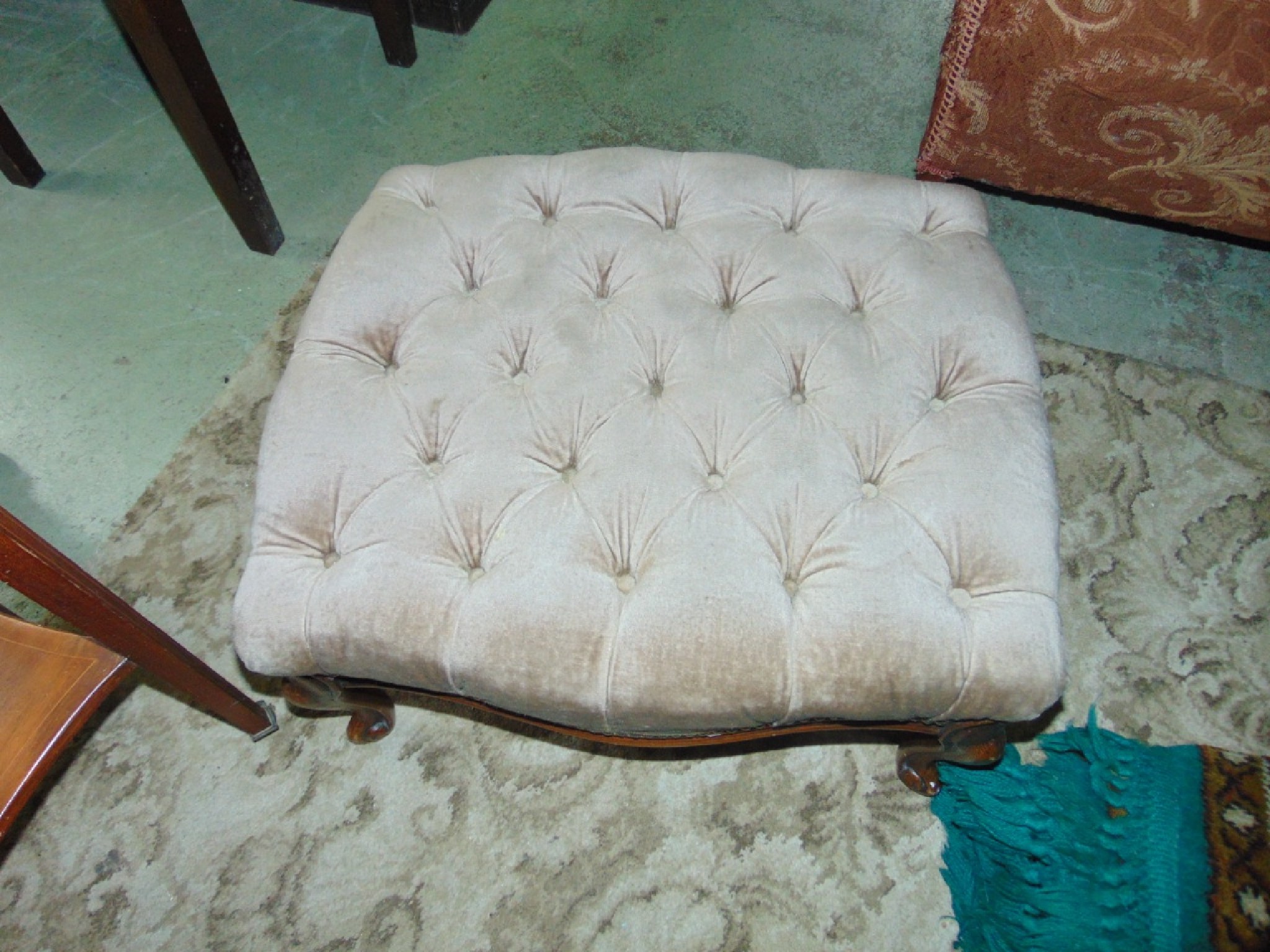 Appraisal: A Victorian style stool with serpentine outline button upholstery and