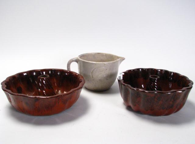 Appraisal: Group of three vintage Redware and pottery including size Turks