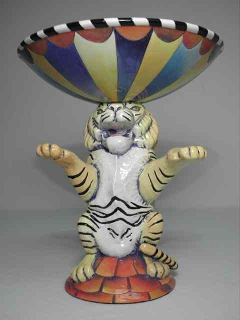 Appraisal: DaNisha contemporary ceramic sculpture Depicts a bowl on a tiger