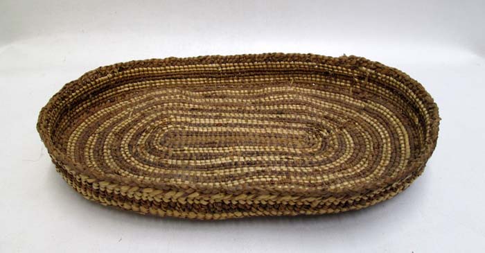 Appraisal: CHEHALIS INDIAN OVAL BASKET TRAY hand made from local materials