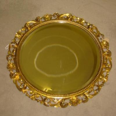 Appraisal: A GILT WOOD AND GESSO FLORENTINE FRAME of circular form