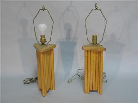 Appraisal: PAIR OF TRIANGULAR BASED WOODEN LAMPS Bases made of wooden