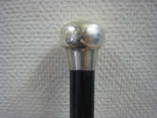 Appraisal: An ebonised hardwood silver topped walking cane London Length cm