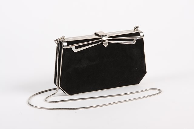 Appraisal: Saks Fifth Avenue black suede evening bag with sterling accent