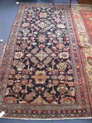 Appraisal: Mahal Persian Handmade Rug floral on indigio field ' ''