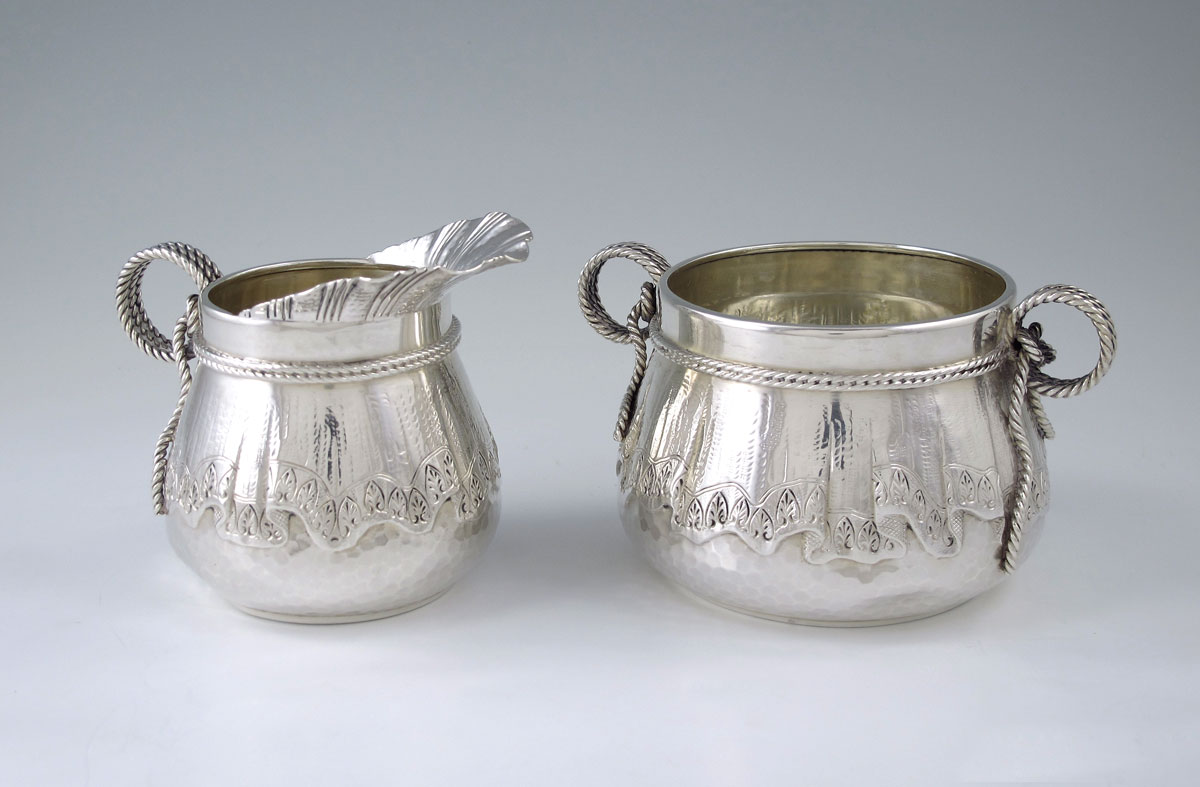 Appraisal: SHEIBLER REPOUSSE STERLING CREAMER AND SUGAR Repousse tapestry motif and