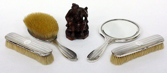 Appraisal: A FOUR PIECE BIRMINGHAM SILVER DRESSING TABLE SET with engine