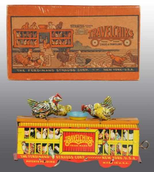 Appraisal: Tin Strauss Travelchiks Wind-Up Toy Description American Working Patent date