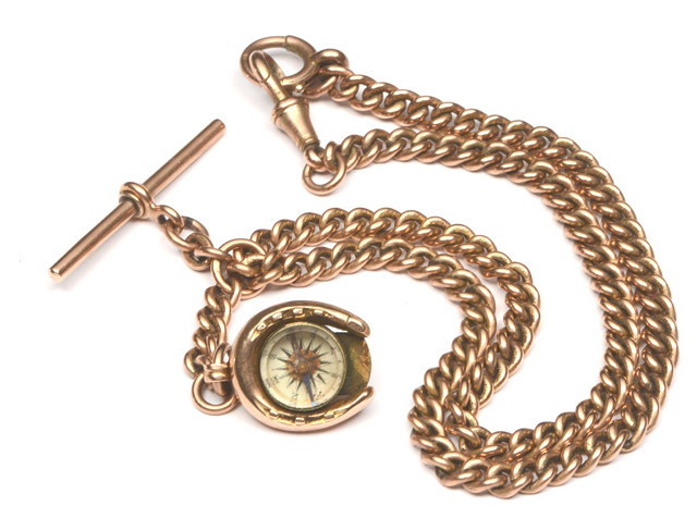 Appraisal: A GOLD WATCH CHAIN of link form with T bar