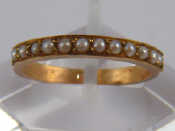 Appraisal: A yellow metal tests carat gold seed pearl ring size