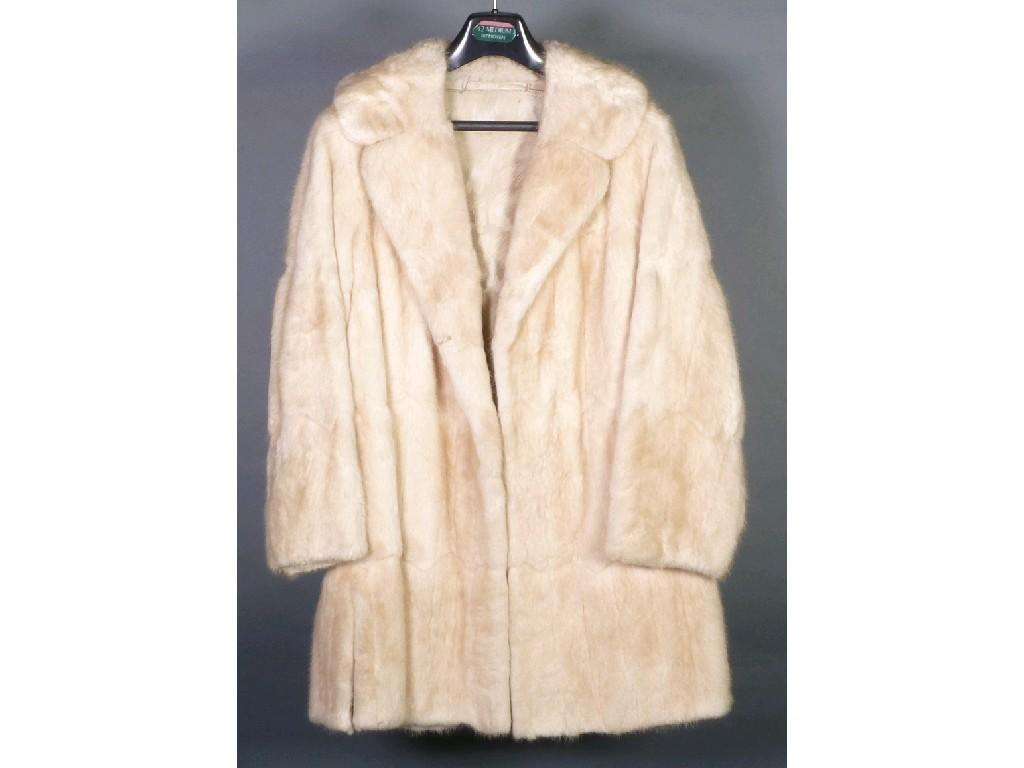 Appraisal: CREAM PASTEL MUSQUASH THREE QUARTER LENGTH FUR COAT size with