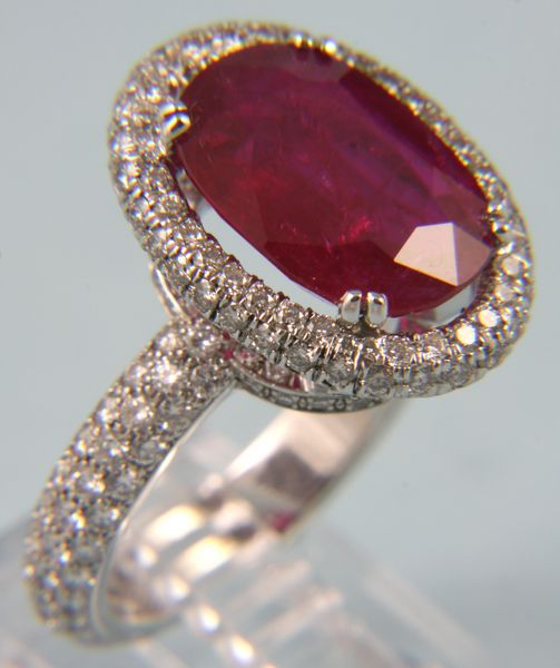 Appraisal: Platinum diamond and heat-treated ruby ring ruby is ct oz