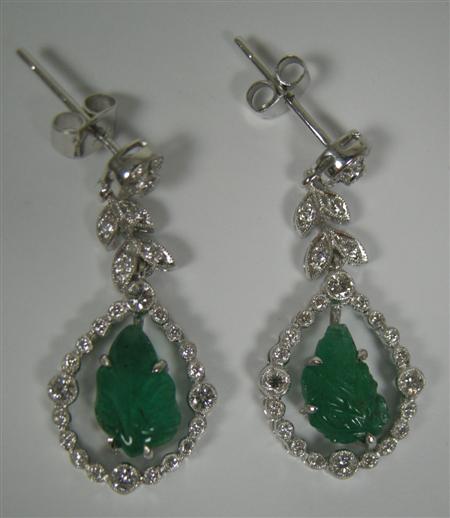 Appraisal: A pair of Belle poque style emerald and diamond pendant