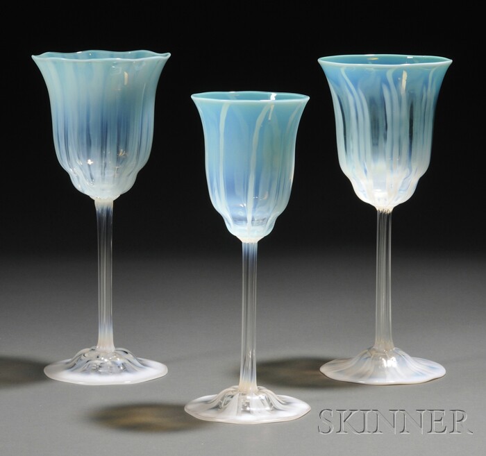 Appraisal: Three Tiffany Favrile Glass Goblets Art glass New York early