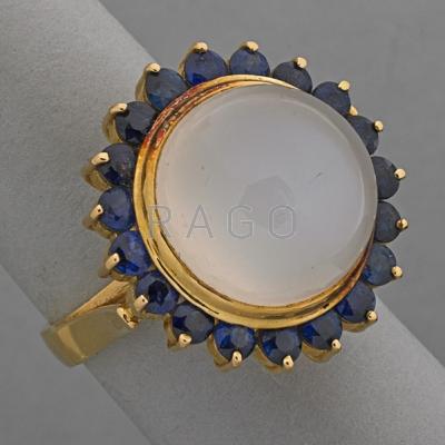 Appraisal: MOONSTONE AND SAPPHIRE K GOLD RING ca Spherical and steep