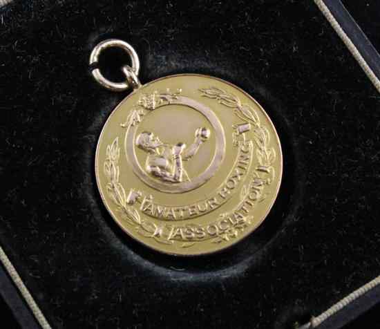 Appraisal: A cased Amateur Boxing Association ct gold medallion decorated with