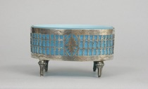 Appraisal: European Silver Footed Container with Glass Insert Pierced oval container