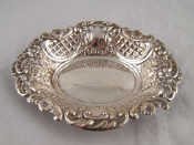 Appraisal: An embossed silver bonbon dish x cm London wt g