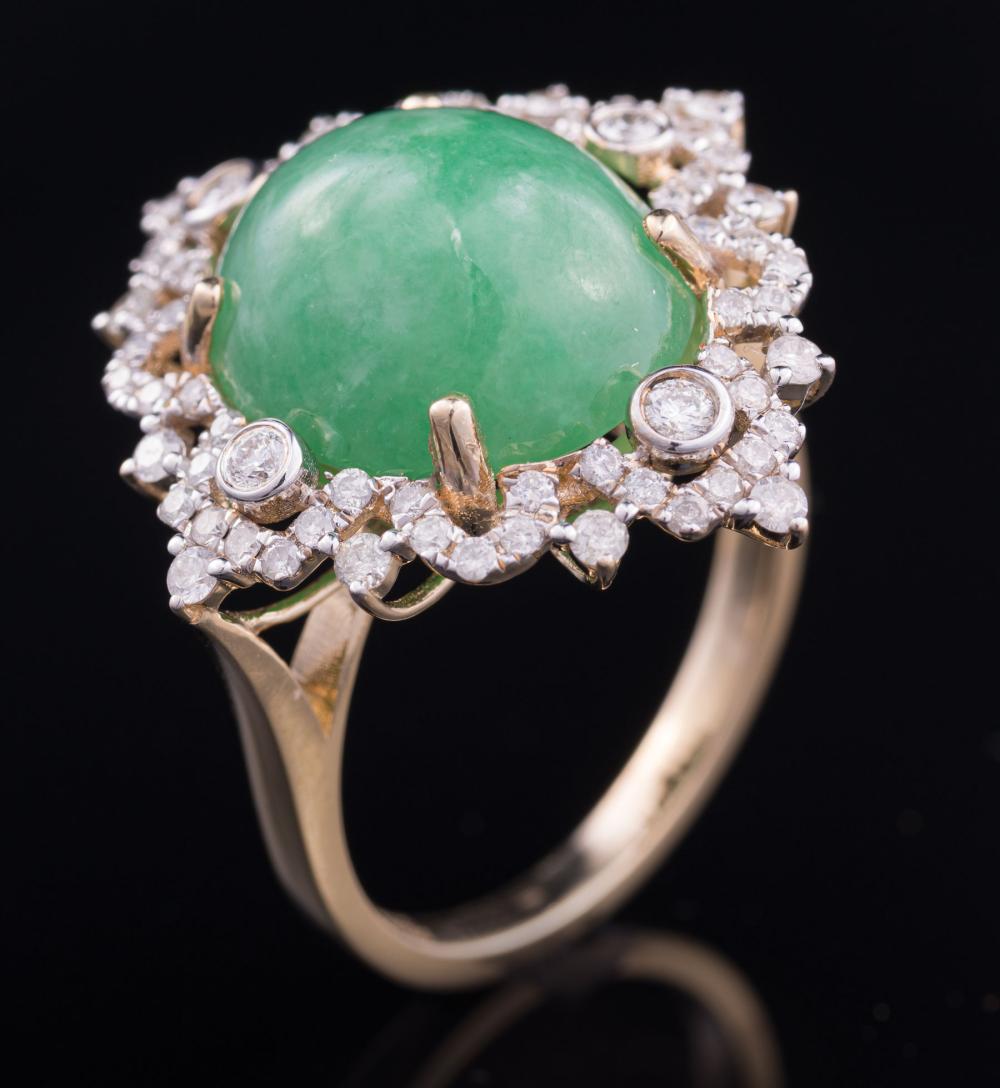 Appraisal: kt Yellow Gold Jadeite and Diamond Ring center with oval