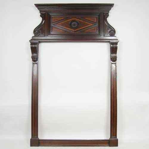 Appraisal: An Italian Baroque Style Walnut Framed Wall Mirror having a