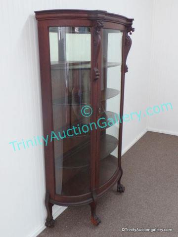 Appraisal: Antique ca Oak Bow front Curio Cabinet This is for